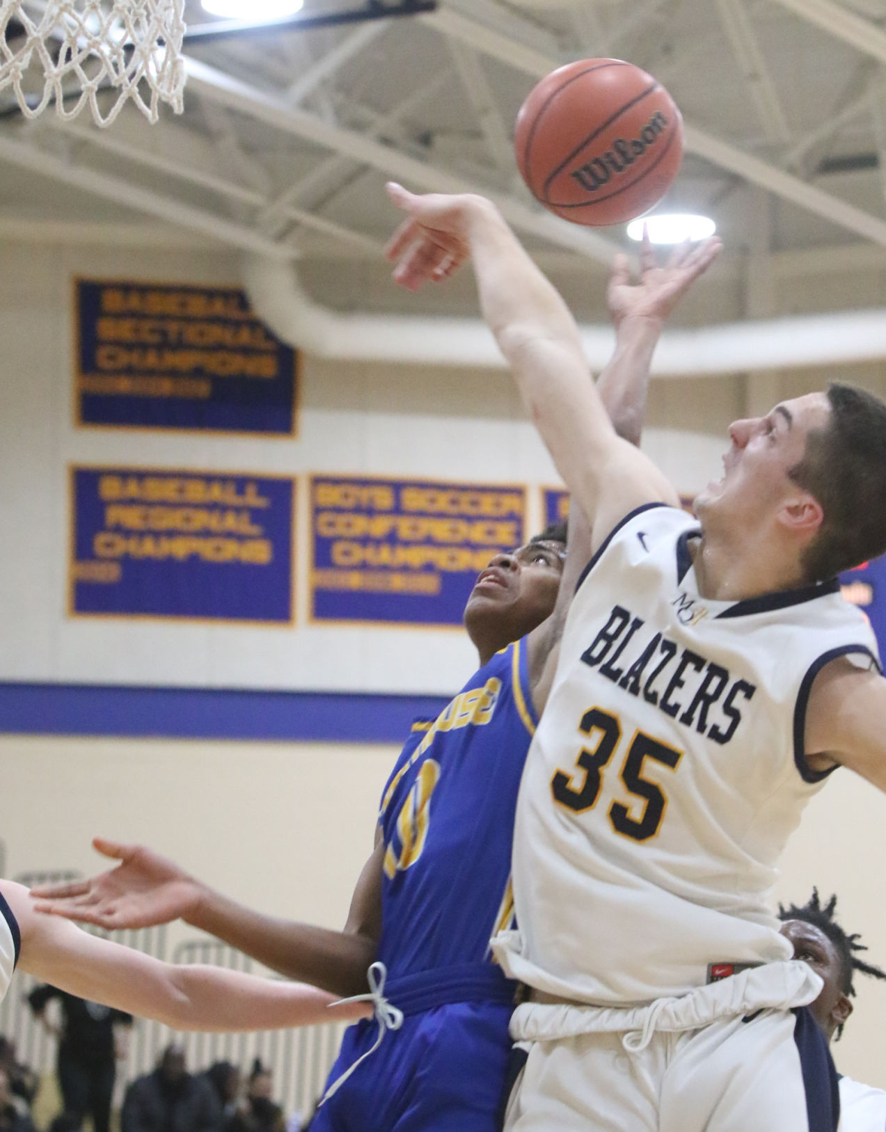 Lighthouse at Marquette Catholic boys basketball